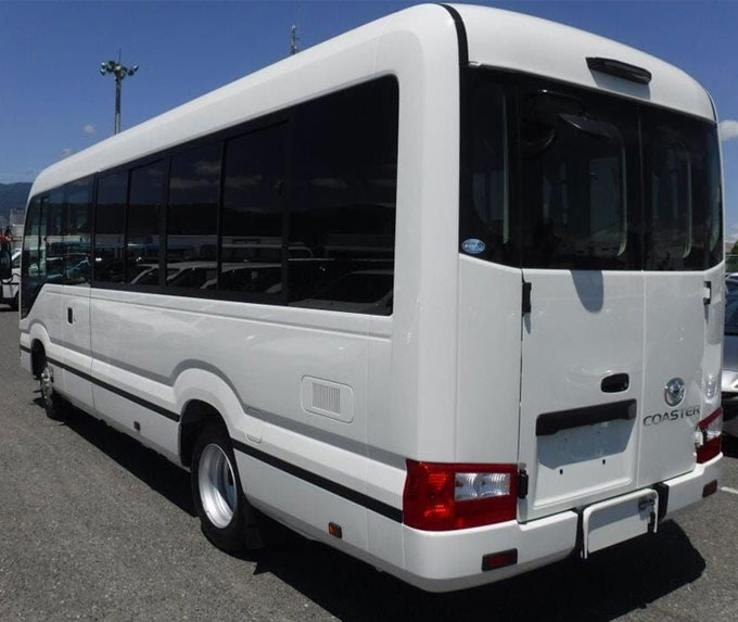toyota coaster luxury mini coach on rent in delhi